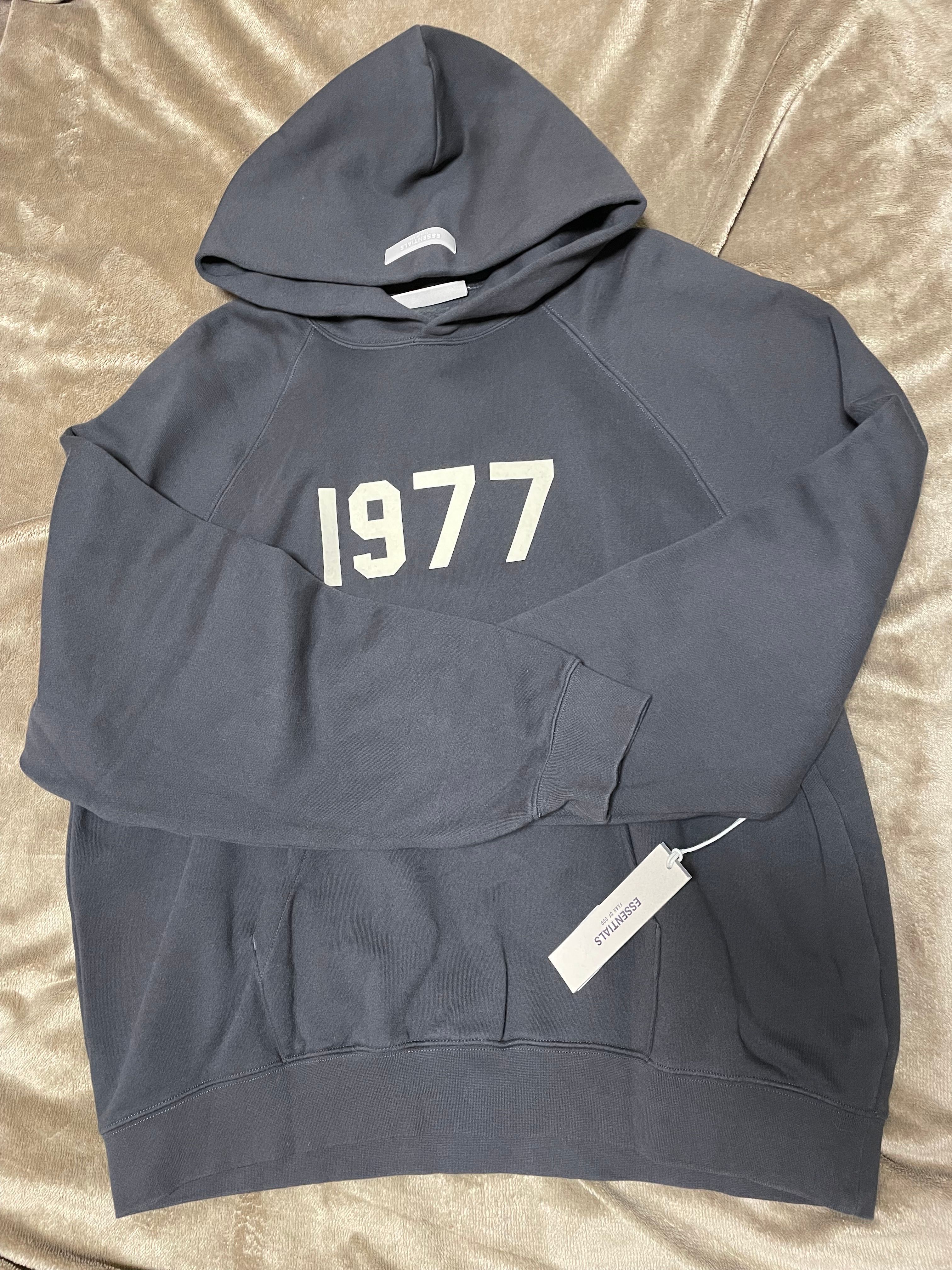FEAR OF GOD ESSENTIALS 1977 HOODIE "Iron"