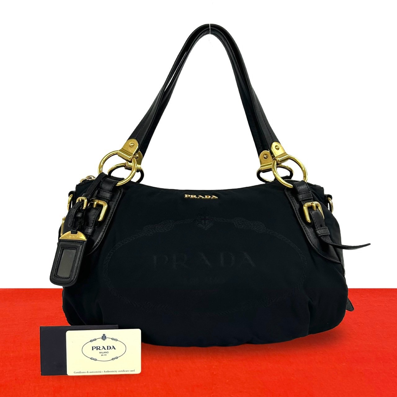 PRADA プラダ ロゴ 金具 ナイロン レザー トートバッグ ブラック
 29399