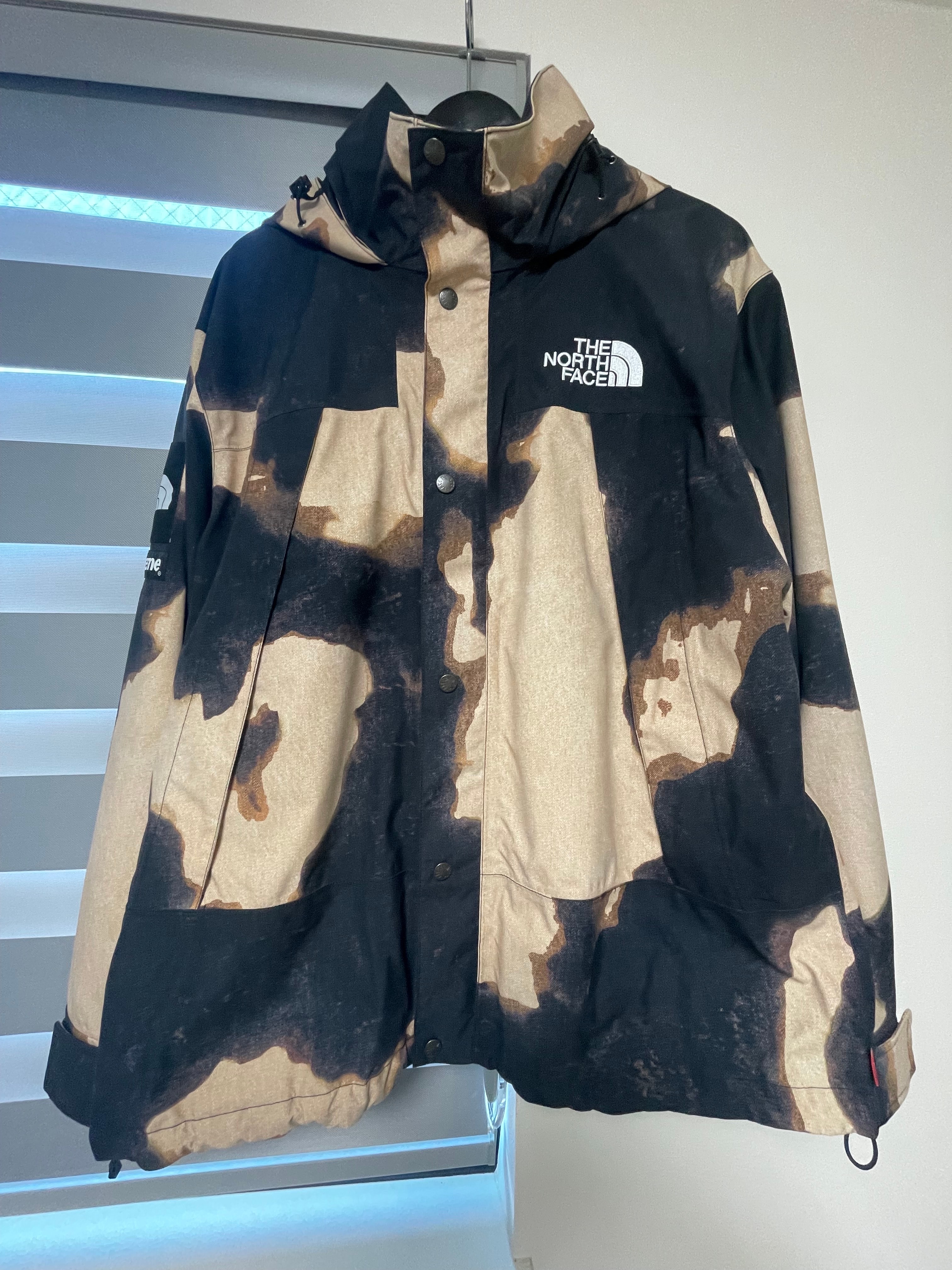 Supreme x The North Face Bleached Denim Print Mountain Jacket