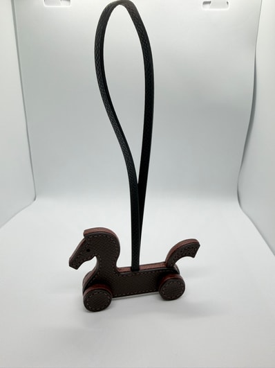 Hermes Cheval A Roulettes Charm "Ebene/Terre/Noir"