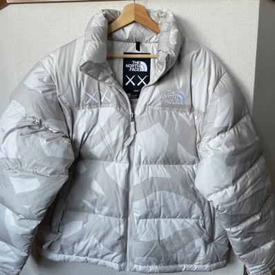 The North Face Kaws Retro 1996 Nuptse Jacket "Moonlight Ivory"