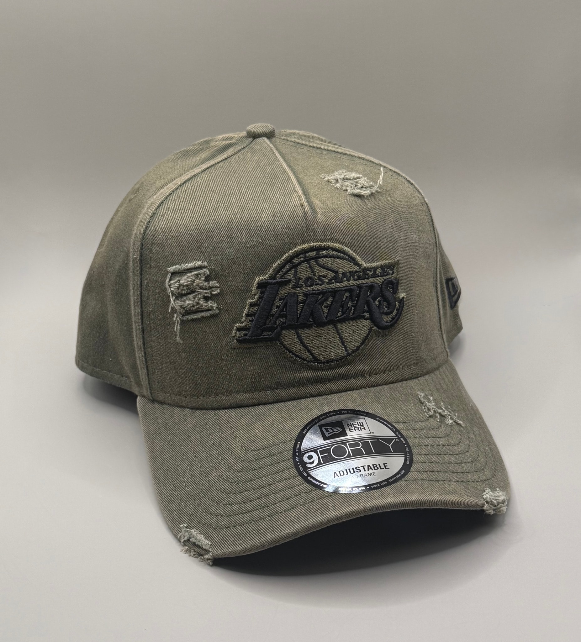 【限定発売】New Era 9FORTY ロサンゼルス・レイカーズ ダメージ加工オリーブ