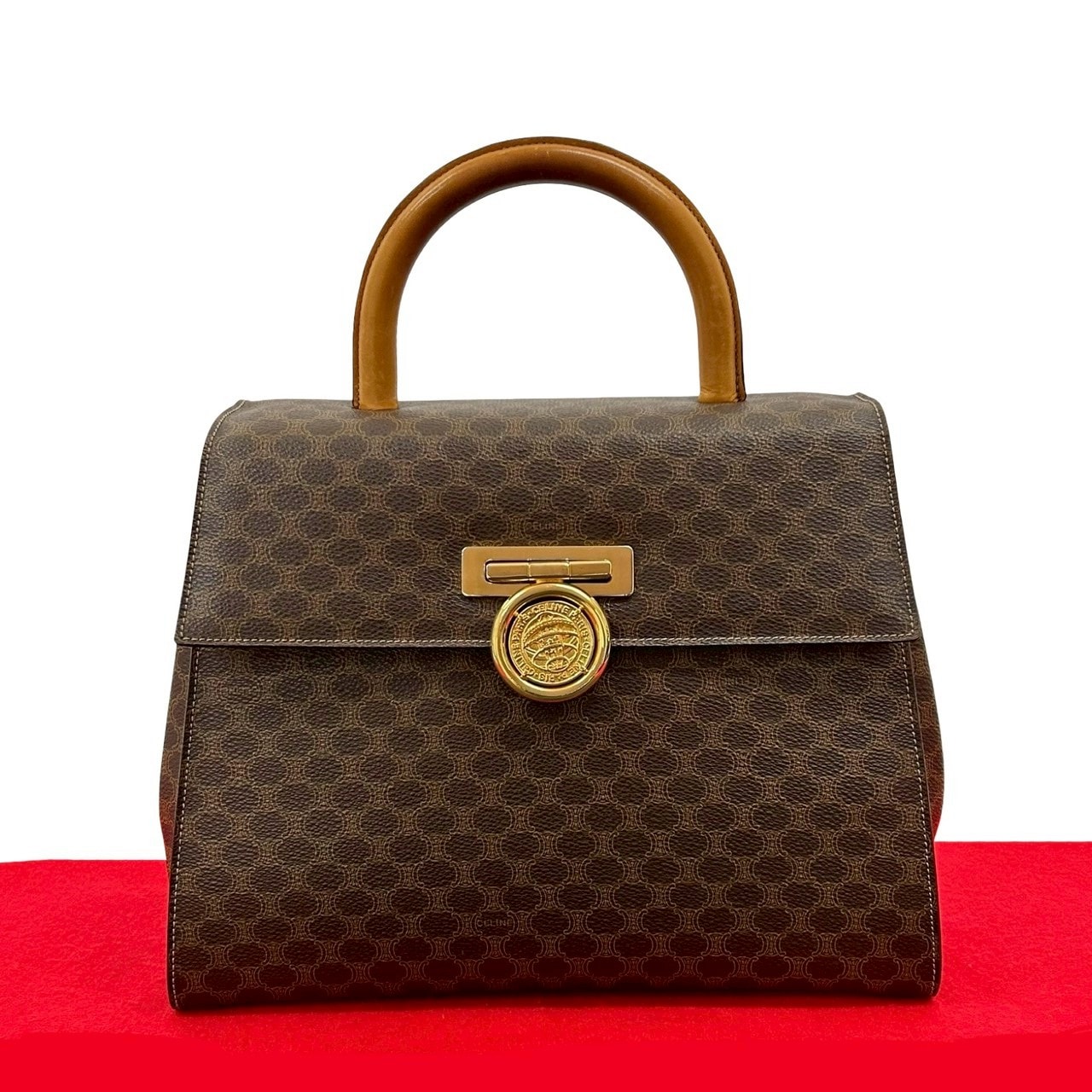 CELINE セリーヌ マカダム ブラゾン トリオンフ 柄 メダル コイン モチーフ 金具 レザー PVC ハンドバッグ ブラウン
24492