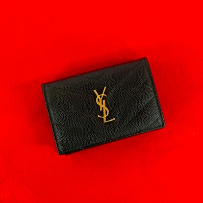 YVES SAINT LAURENT イヴ・サンローラン YSL ロゴ 金具 レザー 三つ折り財布 ブラック
54983