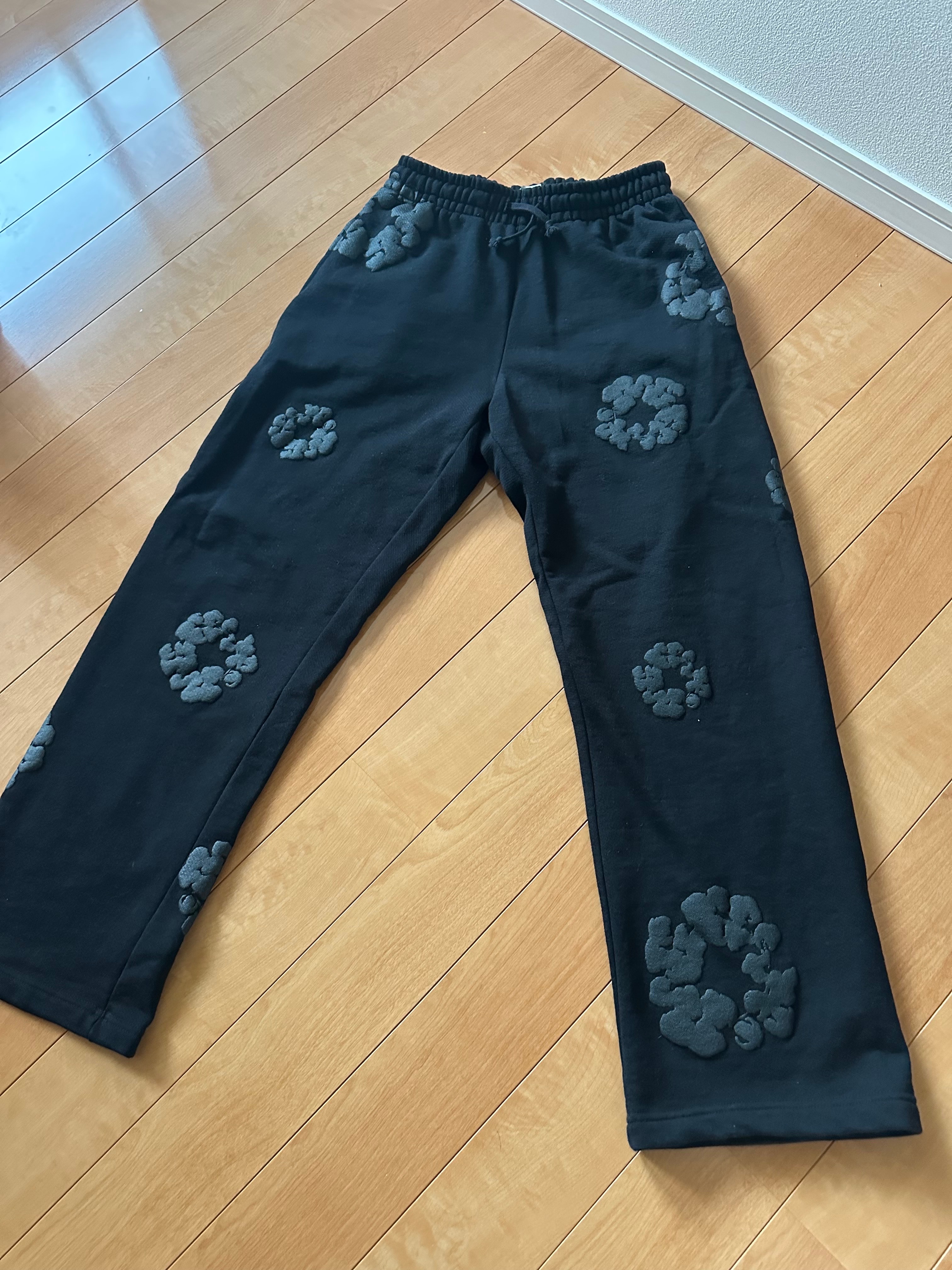 DENIM TEARS Mono Cotton Wreath Baggy Sweatpants "Black"