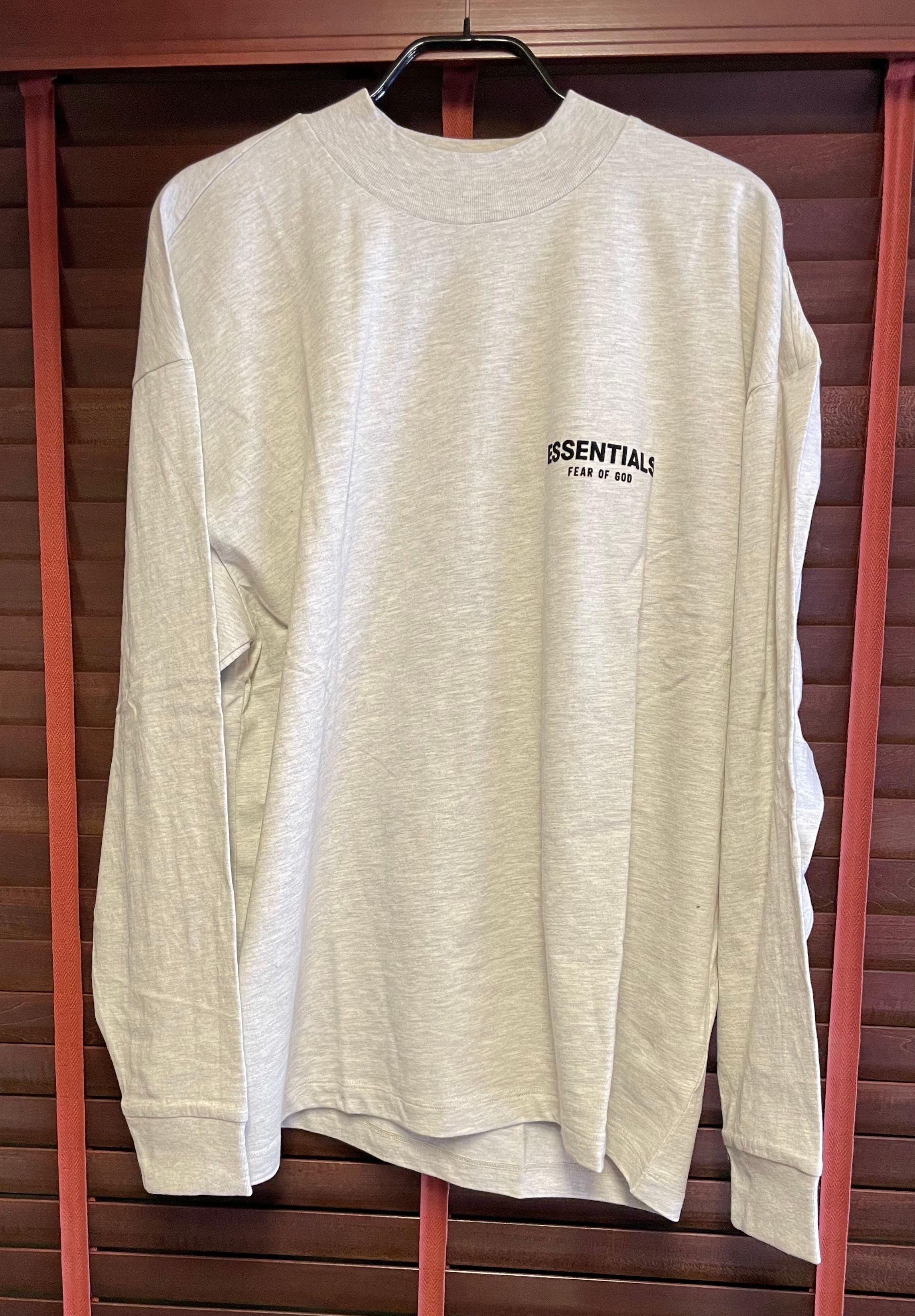 FEAR OF GOD ESSENTIALS BLACK ESS LOGO LS TEE "Light Oatmeal"