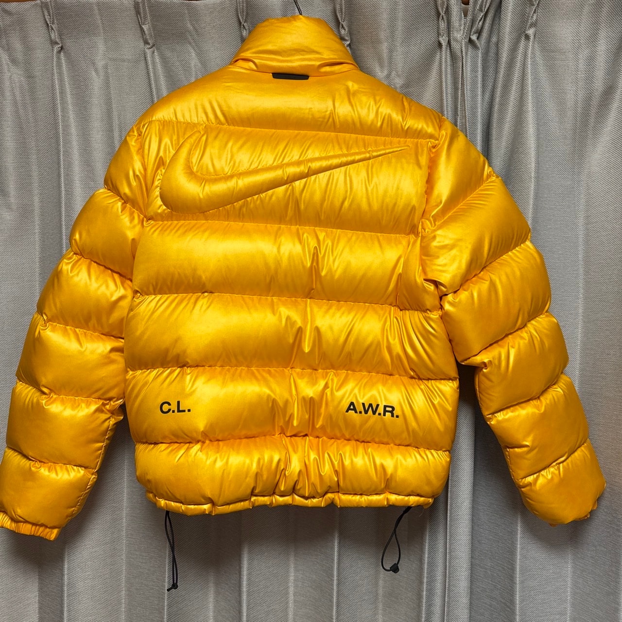 Nike x Drake NOCTA Puffer Jacket "Yellow"