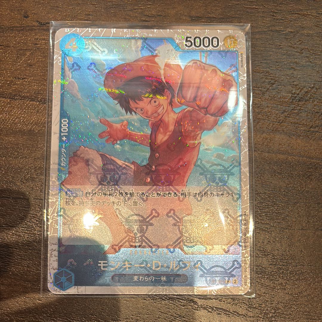 モンキー・D・ルフィ P : 海賊旗フォイル [P-055](プレミアムブースター「ONE PIECE CARD THE BEST」)