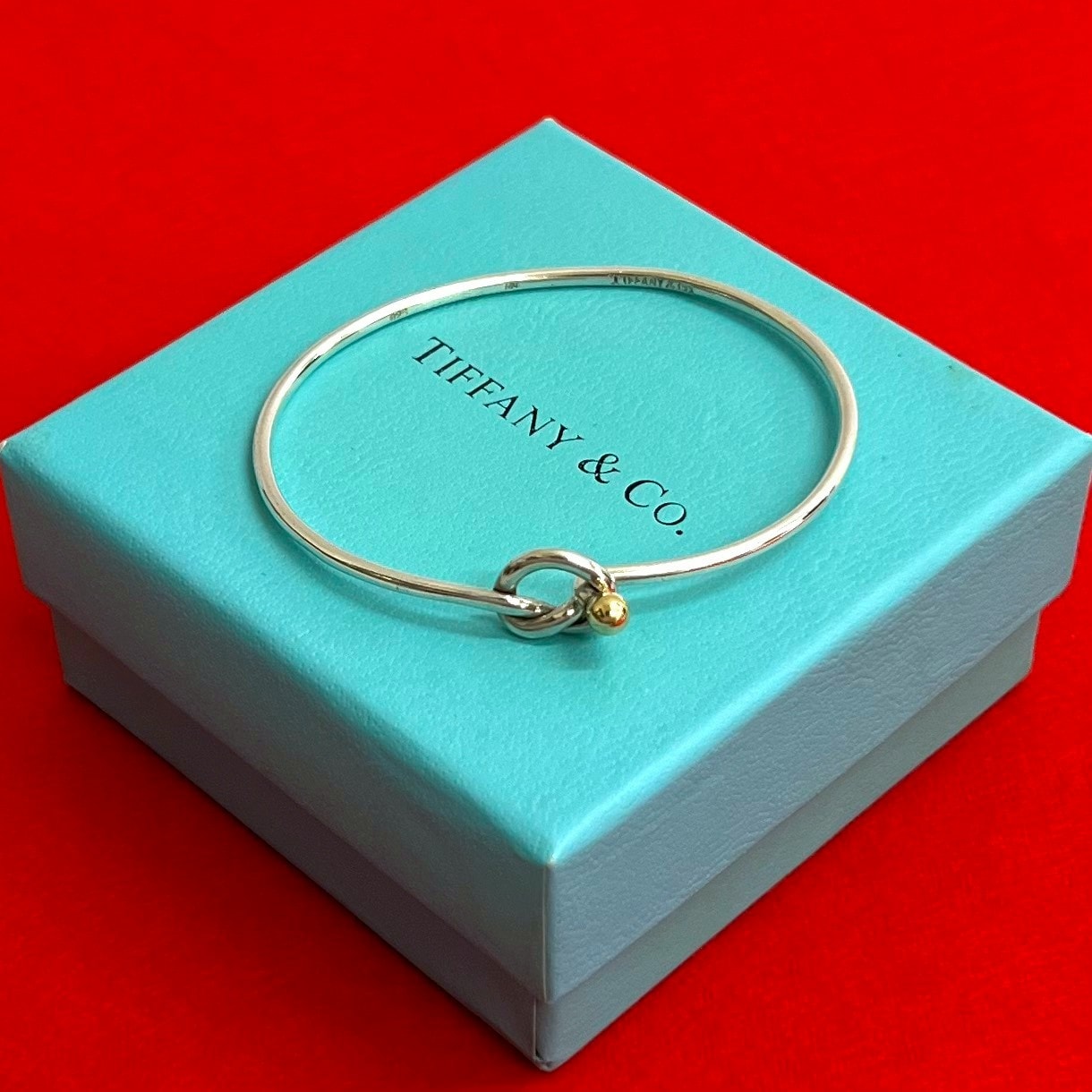 TIFFANY&Co. ティファニー フック&アイ ラブノット バングル シルバー925 K18イエローゴールド バングル シルバー
 06533