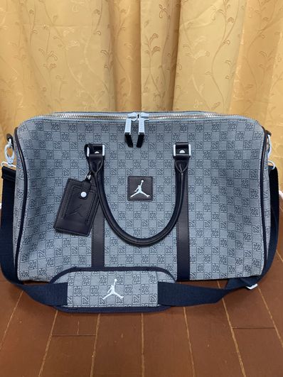 Nike Jordan Brand Monogram Duffle Bag (25L) Nike Jordan Brand Monogram Duffle Bag (25L)