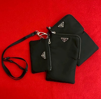 PRADA プラダ Re-Nylon 三角ロゴ 金具 ナイロン ポーチ ブラック
20924
