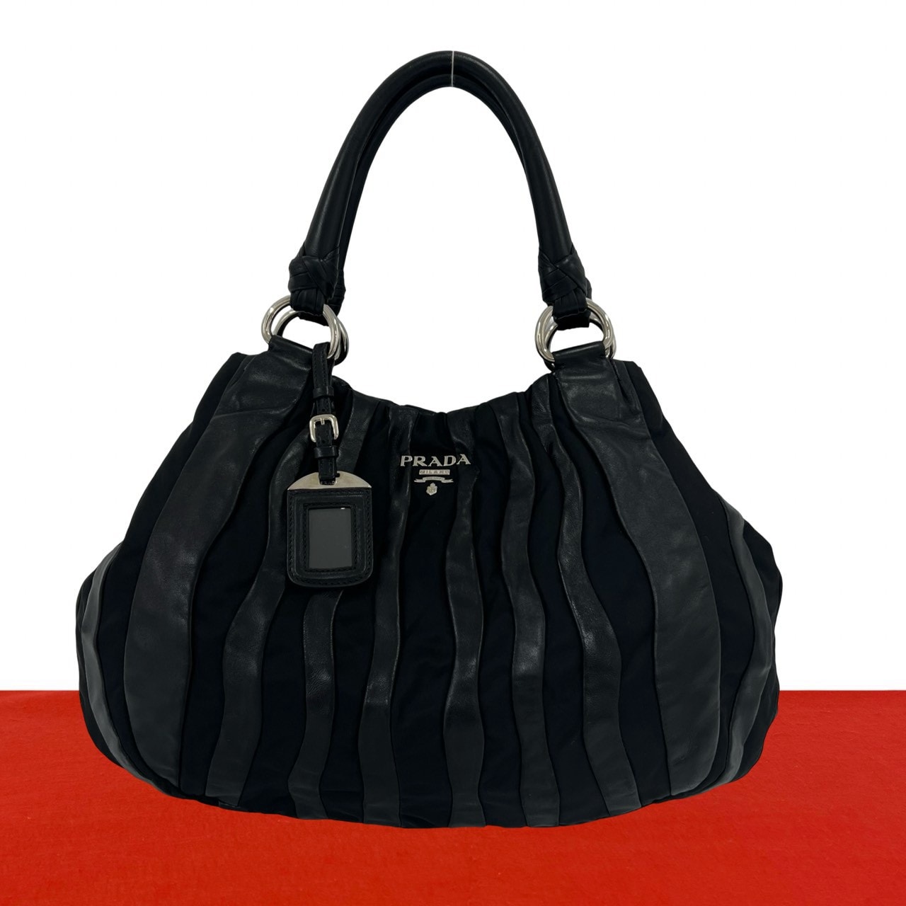 PRADA プラダ ロゴ 金具 ストライプ ナイロン レザー トートバッグ ブラック
10913