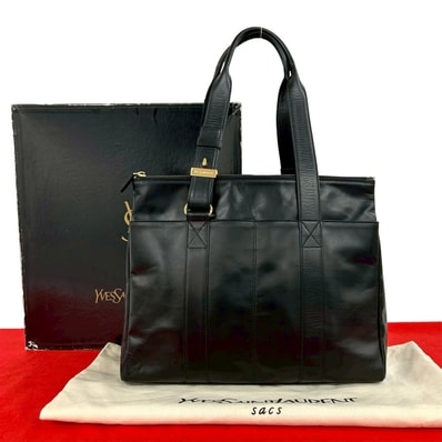 YVES SAINT LAURENT イヴ・サンローラン ロゴ 刻印 金具 レザー トートバッグ ブラック
09394
