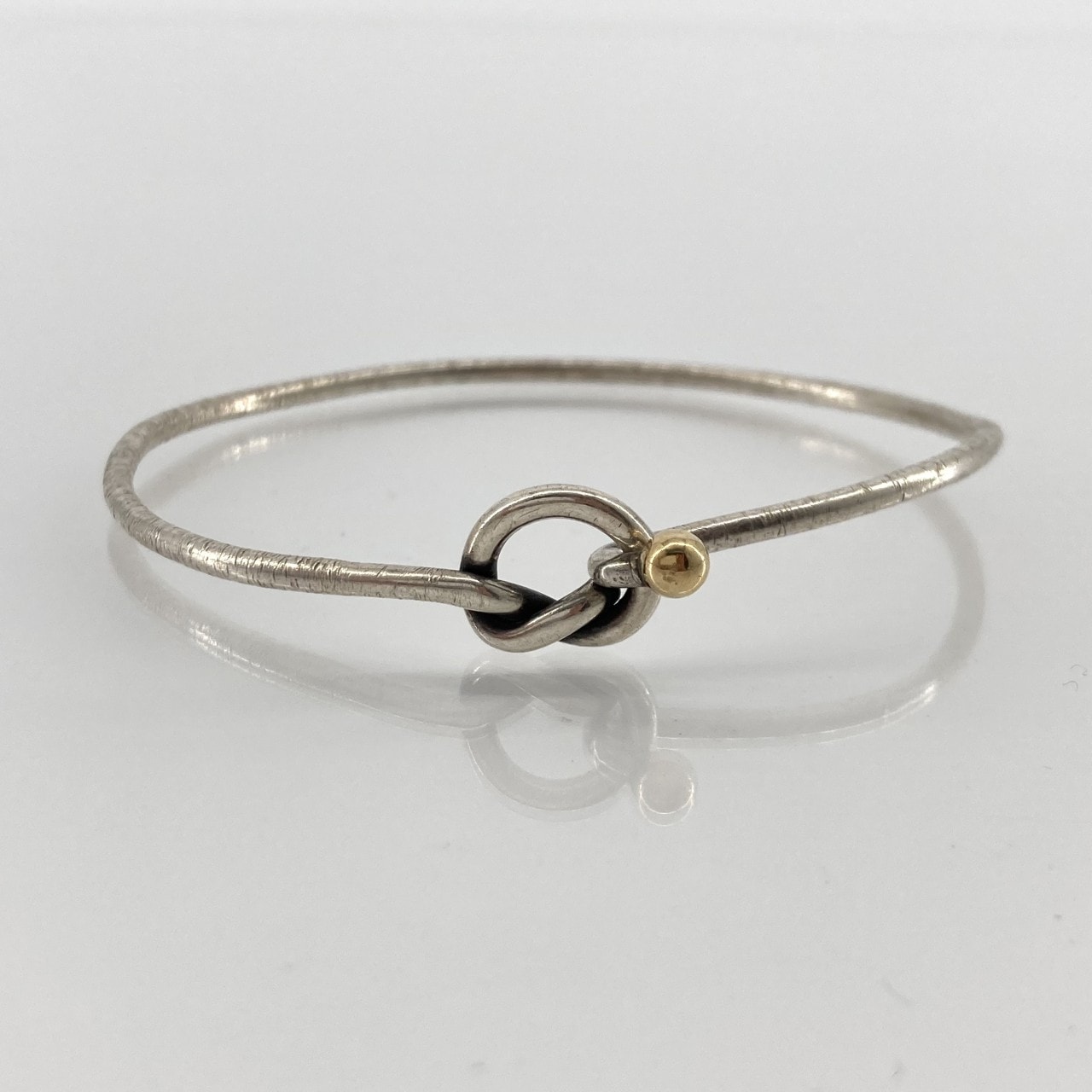 TIFFANY&Co.(ティファニー) ラブノット #17 Ag925 / K18イエローゴールド バングル 7.04g シルバー×ゴールド