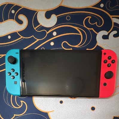 Nintendo Switch 有機EL Model HEG-S-KABAA "Neon Blue / Neon Red"