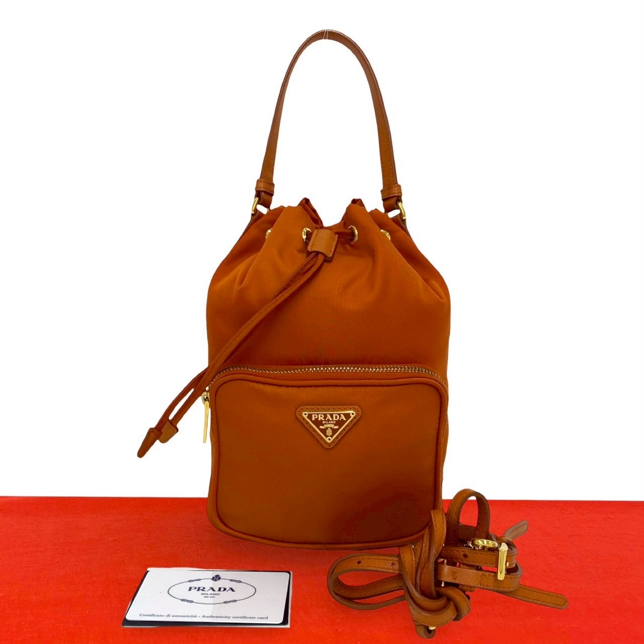 PRADA プラダ 三角ロゴ 金具 ナイロン レザー ショルダーバッグ オレンジ
 95652