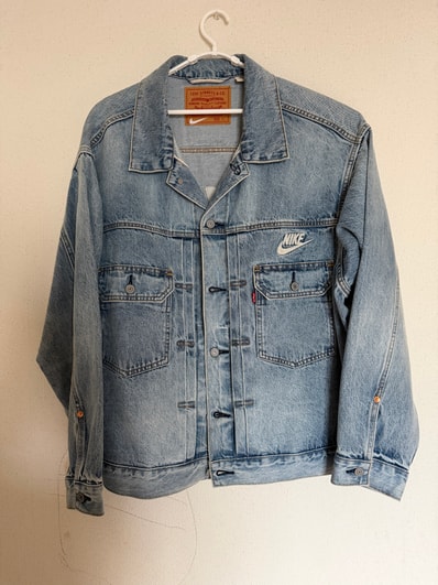 Levi's x Nike Denim Trucker Jacket "Light Indigo" 002TM-0000