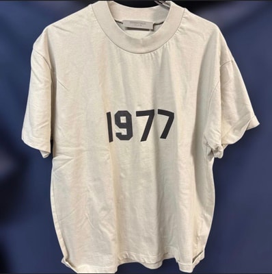 FEAR OF GOD ESSENTIALS WOMEN'S 1977 T-SHIRT "Wheat"