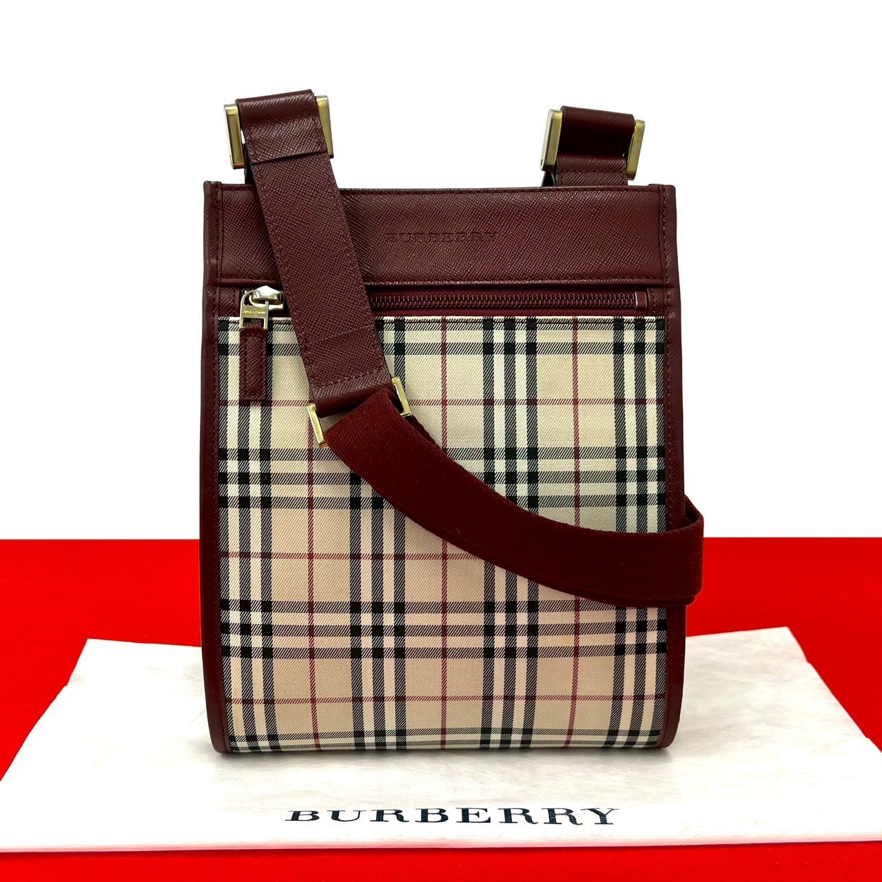 BURBERRY バーバリー ノバチェック 柄 キャンバス レザー ショルダーバッグ レッド
 25401