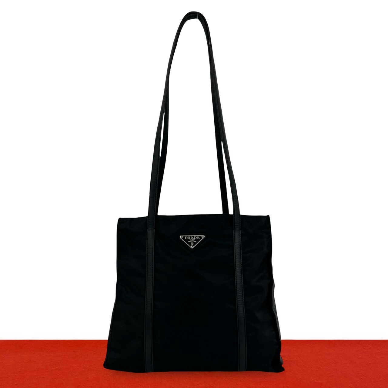 PRADA プラダ 三角ロゴ 金具 ナイロン レザー トートバッグ ブラック
 25589