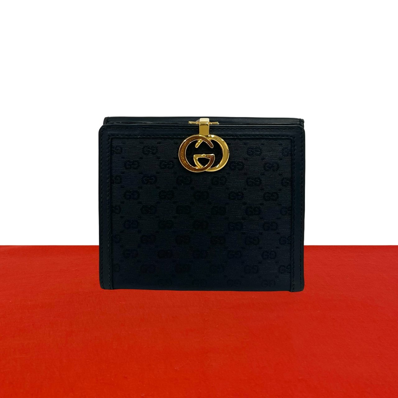 GUCCI グッチ マイクロGG ロゴ 金具 レザー PVC 二つ折り財布 ブラック
08257