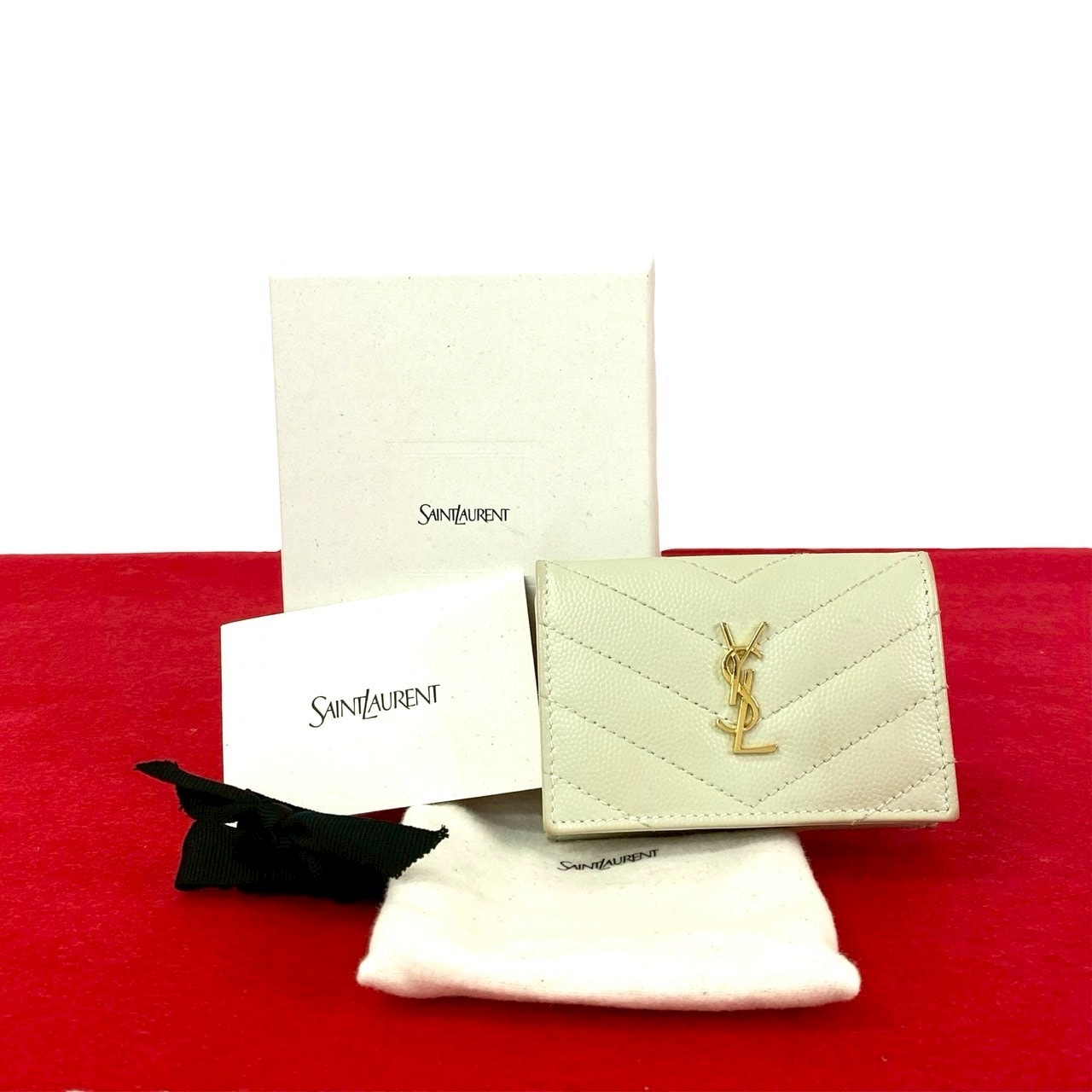 YVES SAINT LAURENT イヴ・サンローラン YSL ロゴ 金具 レザー 三つ折り財布 ホワイト
 ss676