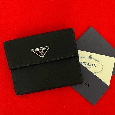 PRADA プラダ 三角ロゴ 金具 ナイロン 二つ折り財布 ブラック
18341