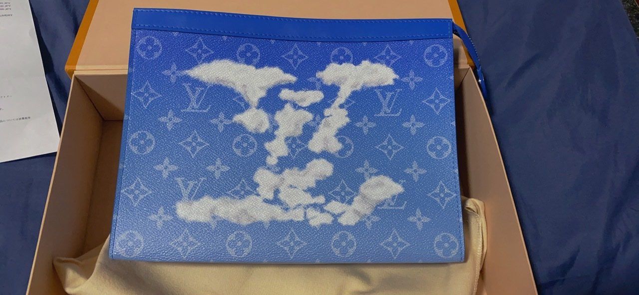 Louis Vuitton Soft Trunk Necklace Wallet Monogram Crowds