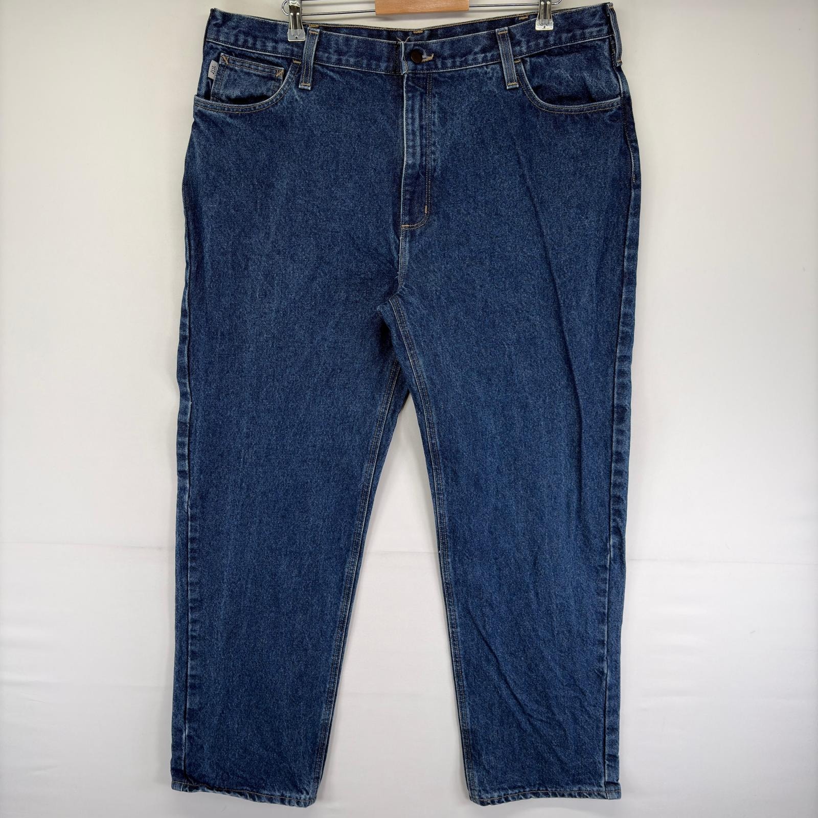 古着 カーハート Carhartt デニム パンツ ワンポイントロゴ 大きいサイズ ジーンズ ジーパン ジッパーフライ w42 L34  ブルー系 メンズ