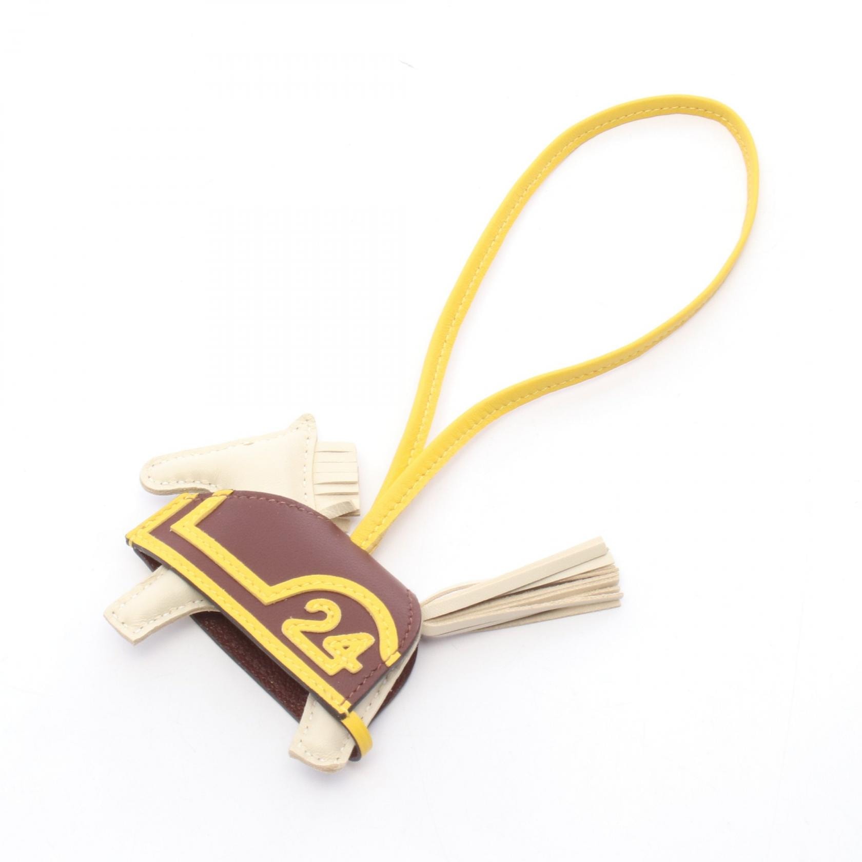 エルメス HERMES ロデオPM ロベオクール クレ テール ジョーヌナプル チャーム アクセサリー アニョーミロ / ヴォースイフト アニョーミロ ボルドー レディース アイボリー系 / ボルドー系 / イエロー系 【中古】