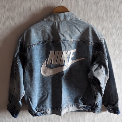Levi's x Nike Denim Trucker Jacket "Light Indigo" 002TM-0000