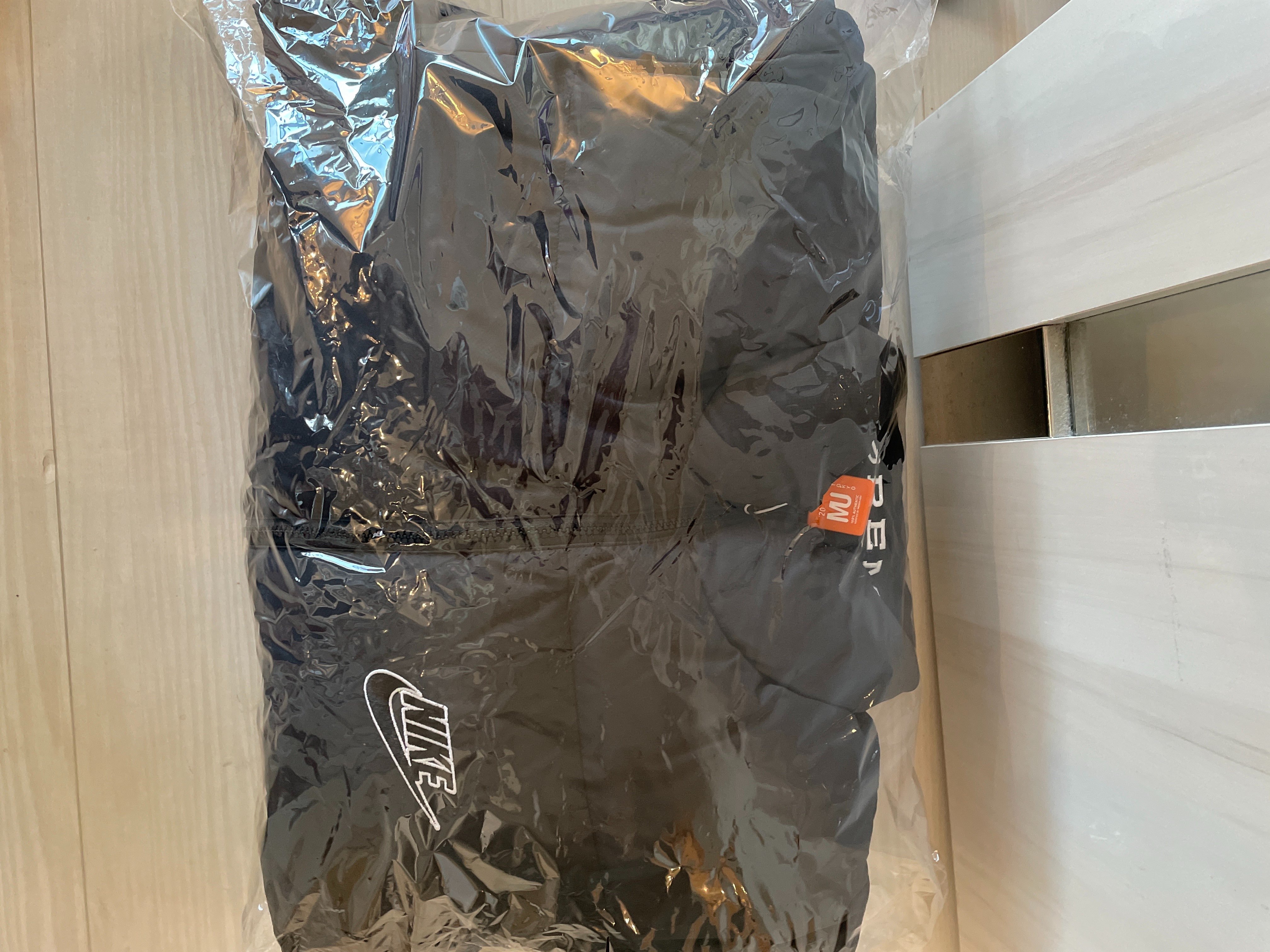 Supreme / Nike® Reversible Puffy Jacket "Black"