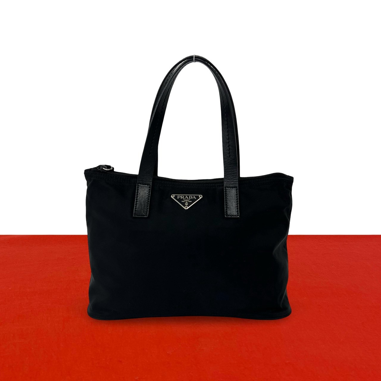 PRADA プラダ 三角ロゴ 金具 ナイロン レザー ハンドバッグ ブラック
 49069