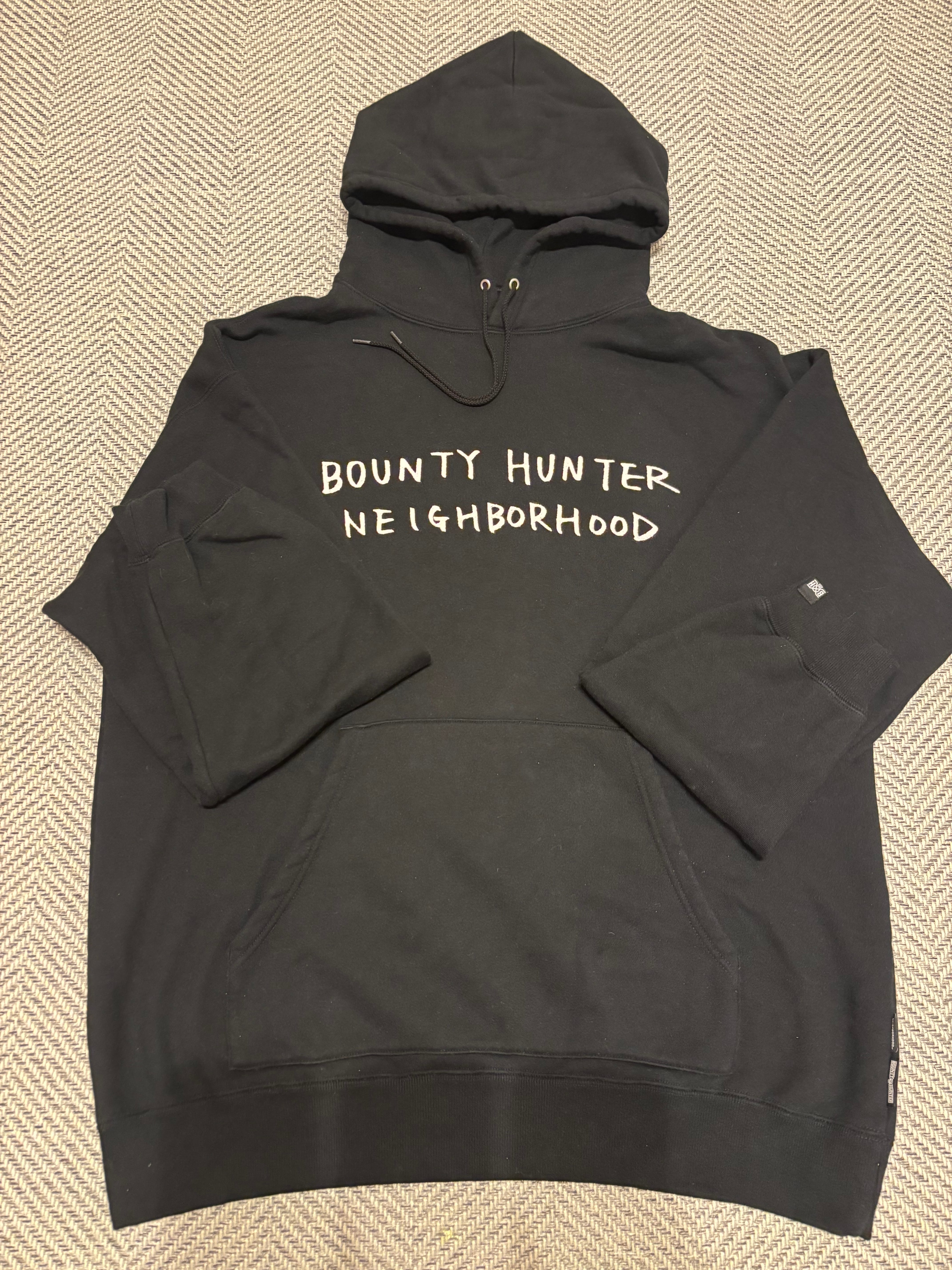 NEIGHBORHOOD x Bounty hunter . Hooded LS . CO "Black"