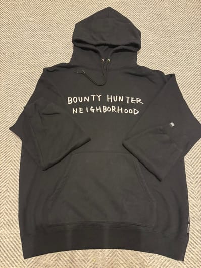 NEIGHBORHOOD x Bounty hunter . Hooded LS . CO "Black"