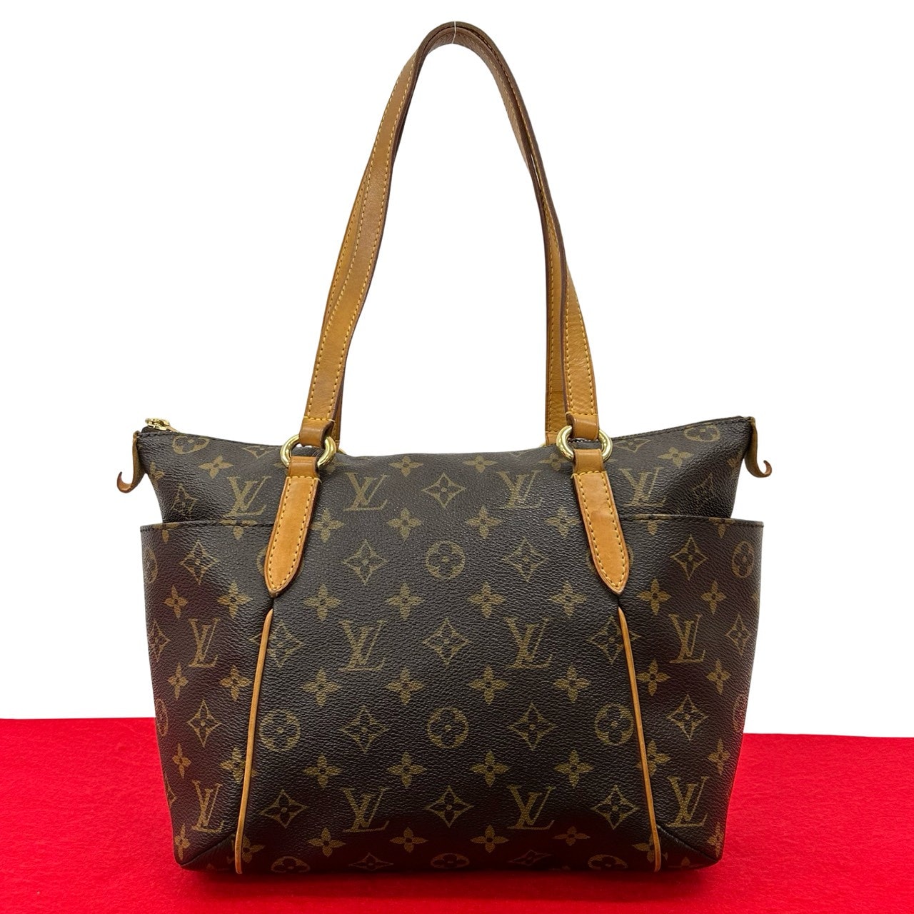 LOUIS VUITTON ルイヴィトン トータリー PM モノグラム レザー PVC トートバッグ ブラウン
22871