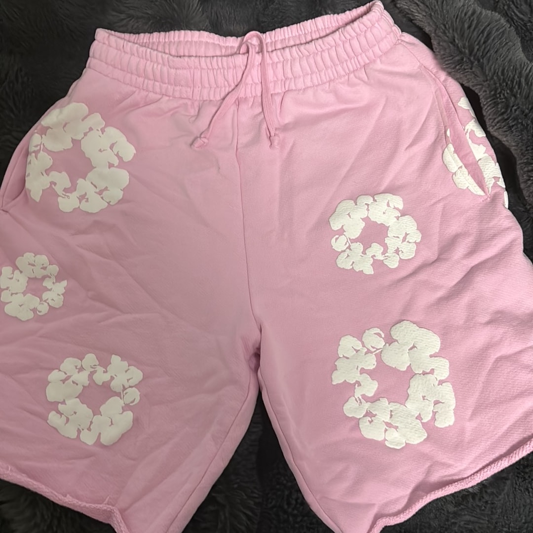 DENIM TEARS Cotton Wreath Sweatshorts "Powder Pink"