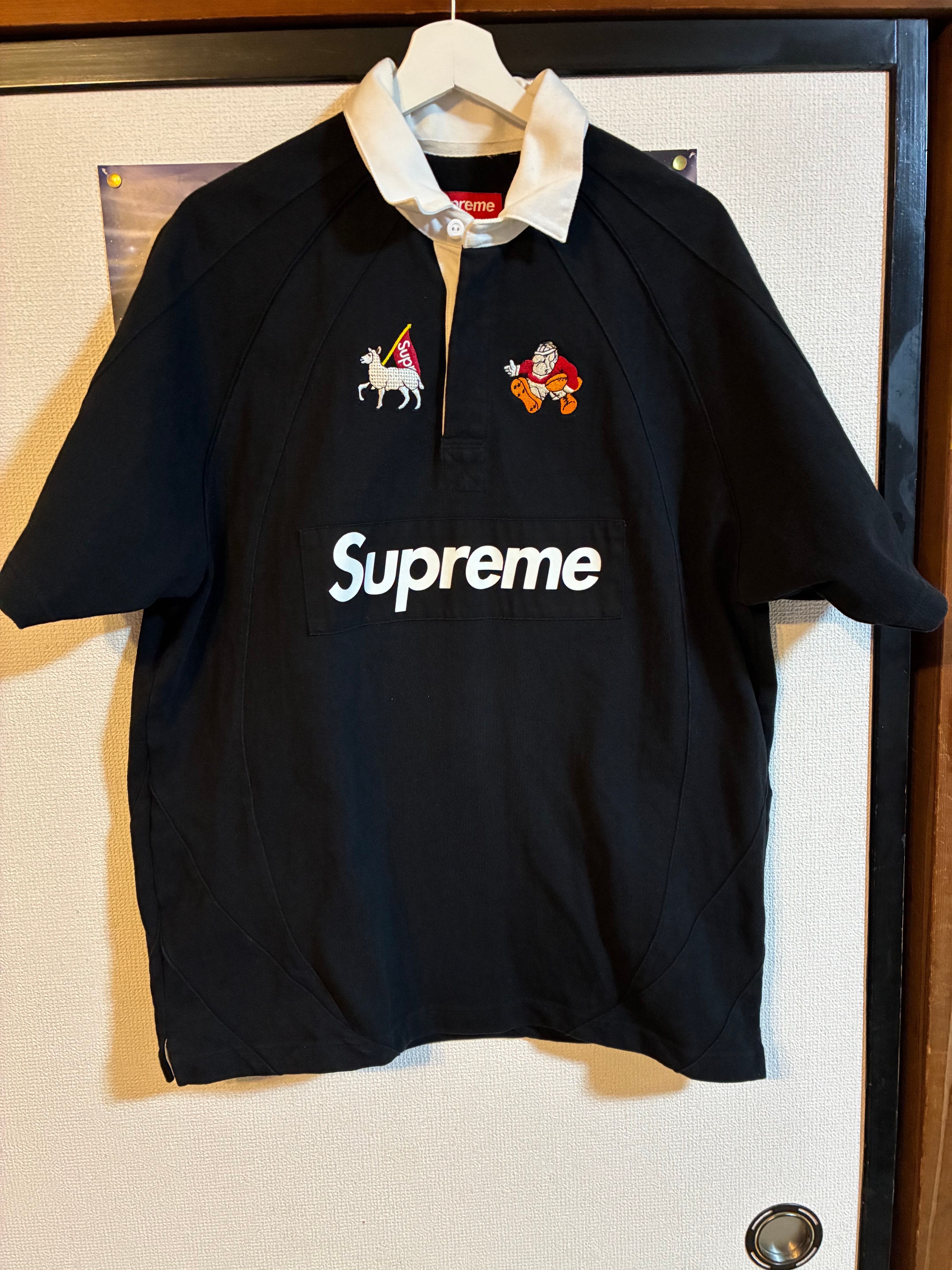 ウェア Supreme S/S Rugby Black M Supreme S/S Rugby BlackSupreme S/S Rugby Black - OFour