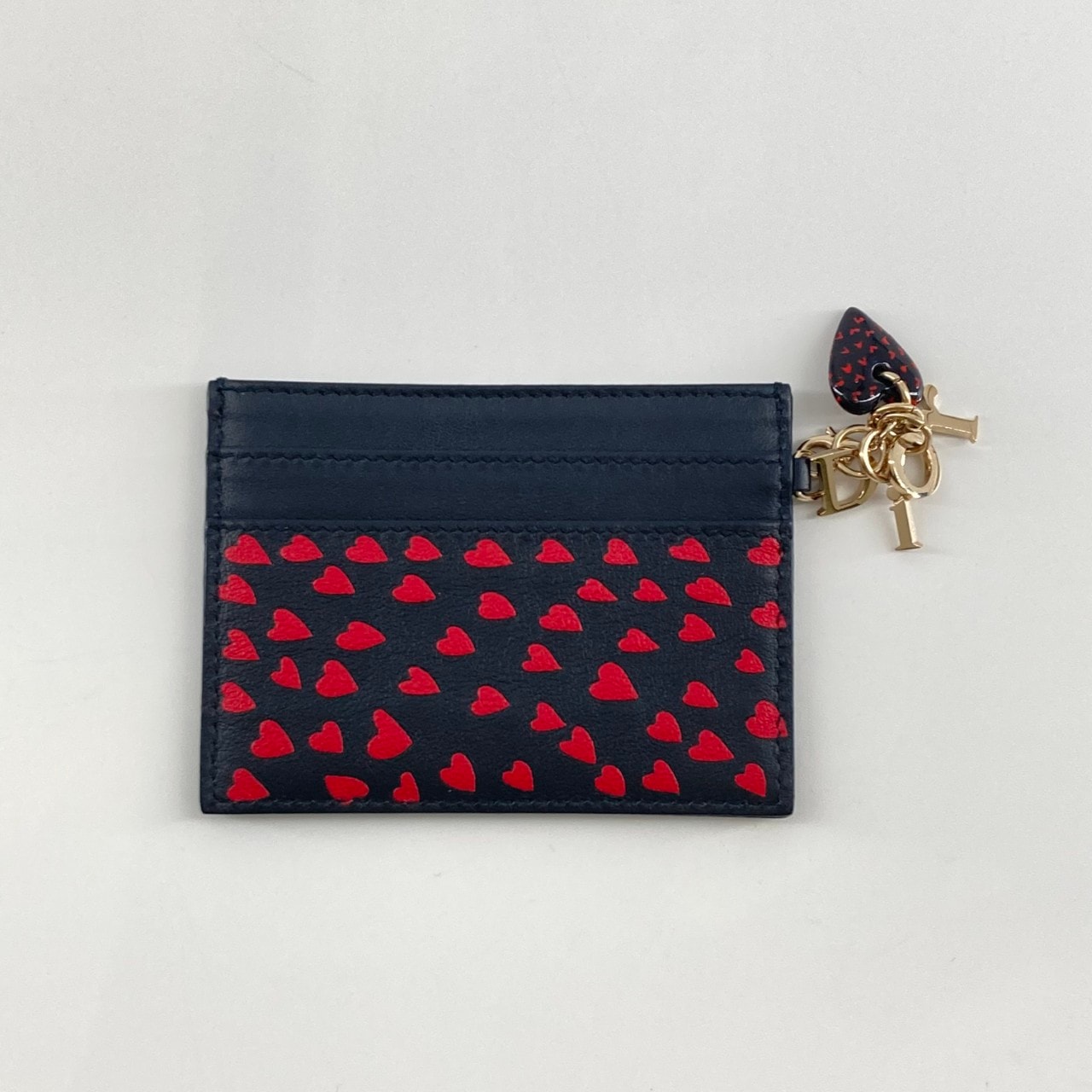 Christian Dior(クリスチャンディオール) ハートプリント チャーム付き カードケース レッド×ブラック