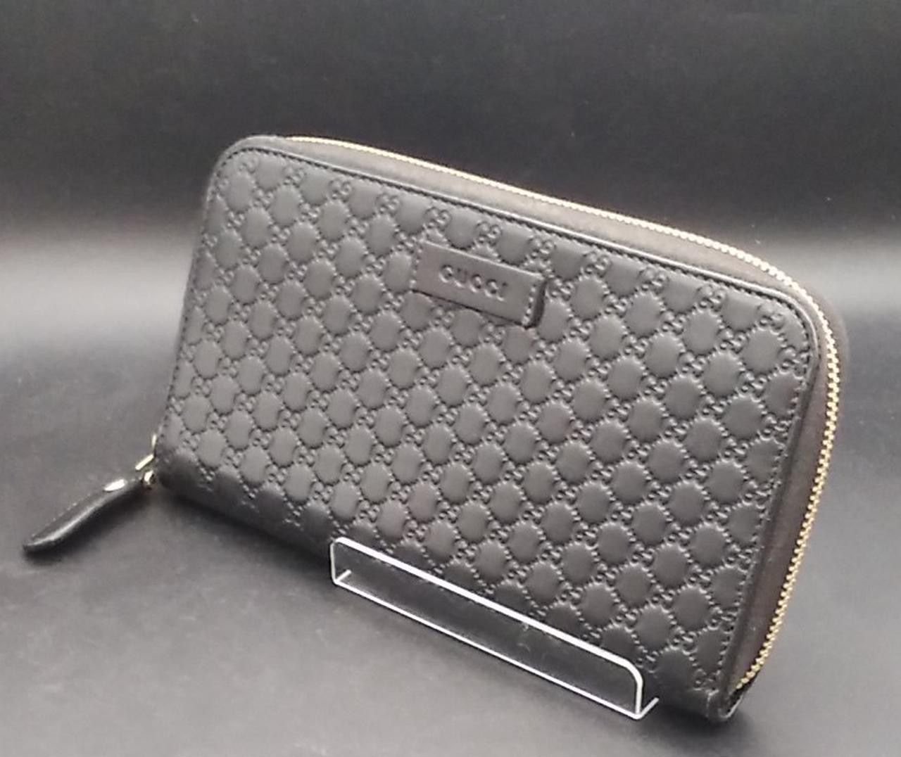 GUCCI Micro Guccissima Round Fastener Wallet "Black"