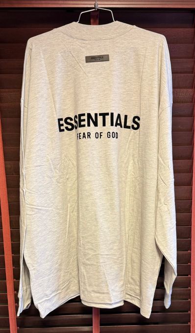 FEAR OF GOD ESSENTIALS BLACK ESS LOGO LS TEE "Light Oatmeal"