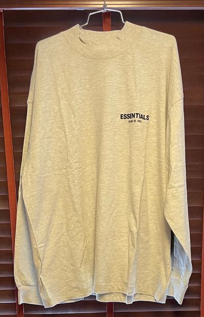 FEAR OF GOD ESSENTIALS BLACK ESS LOGO LS TEE "Light Oatmeal"