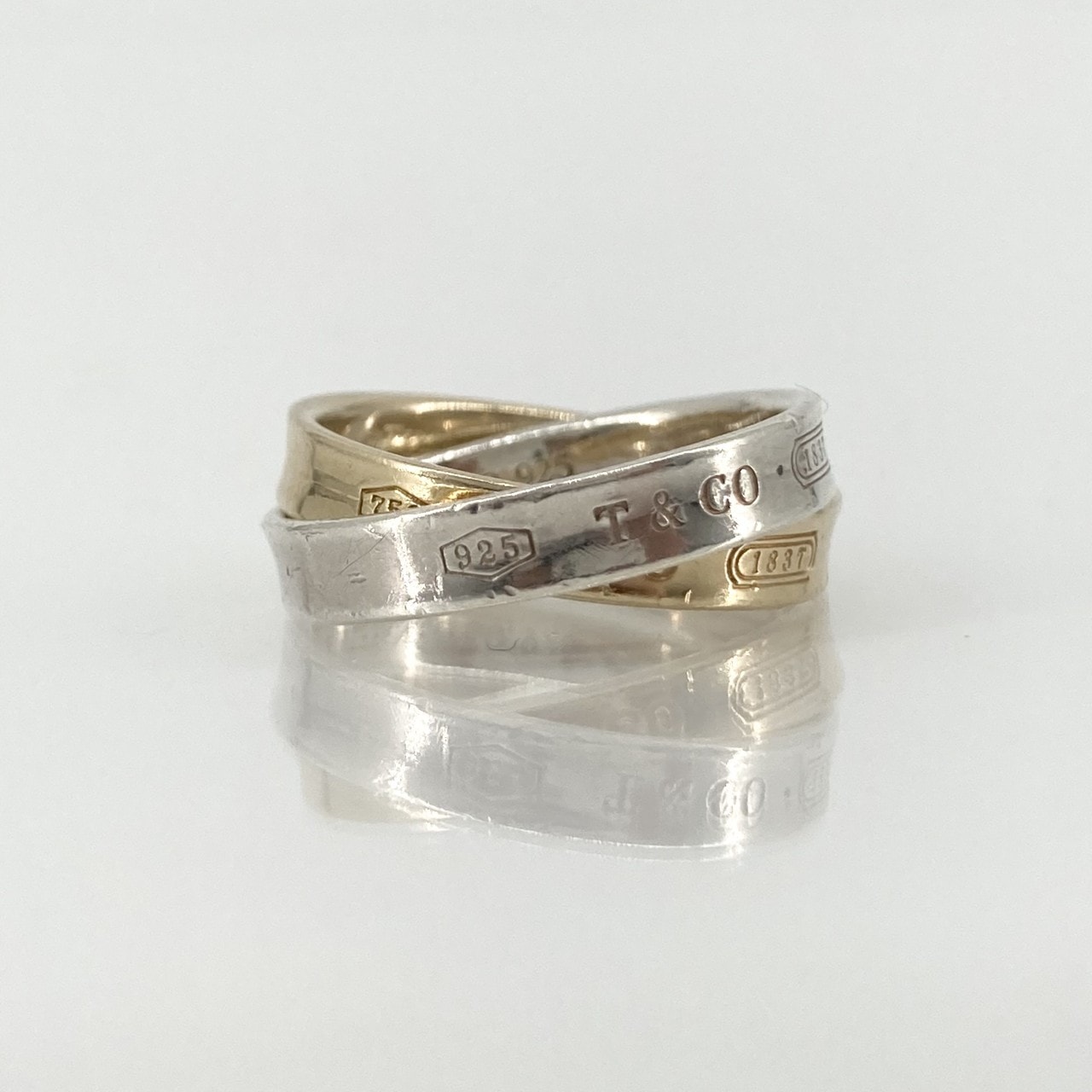 TIFFANY&Co.(ティファニー) インターロッキング サークル Ag925/Au750 #11号 リング・指輪 6.09g シルバー×ゴールド