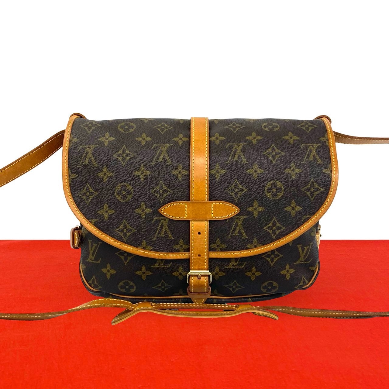 LOUIS VUITTON ルイヴィトン ソミュール 30 モノグラム レザー PVC ショルダーバッグ ブラウン
02503