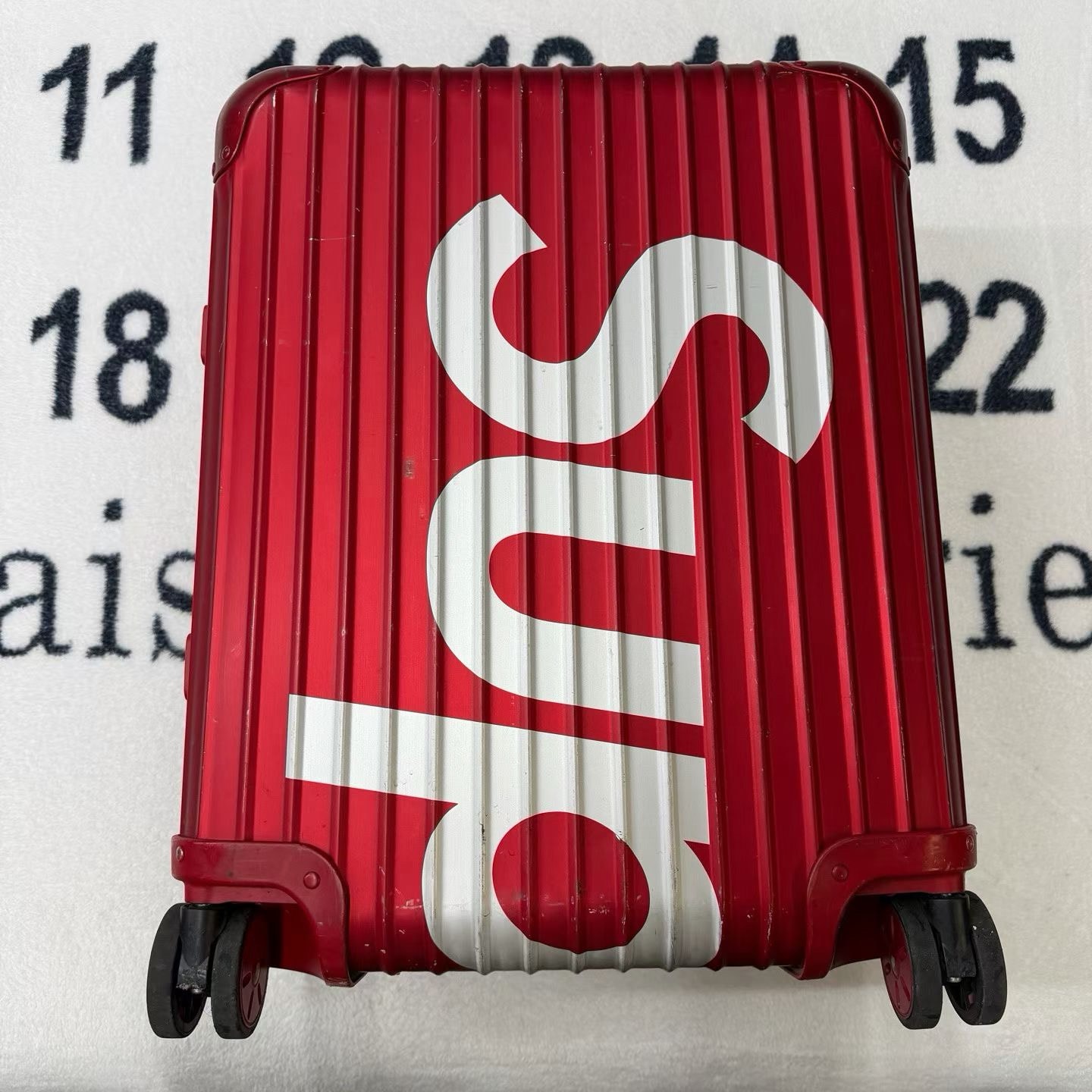 Supreme / RIMOWA Topas Multiwheel® 45L "Red"
