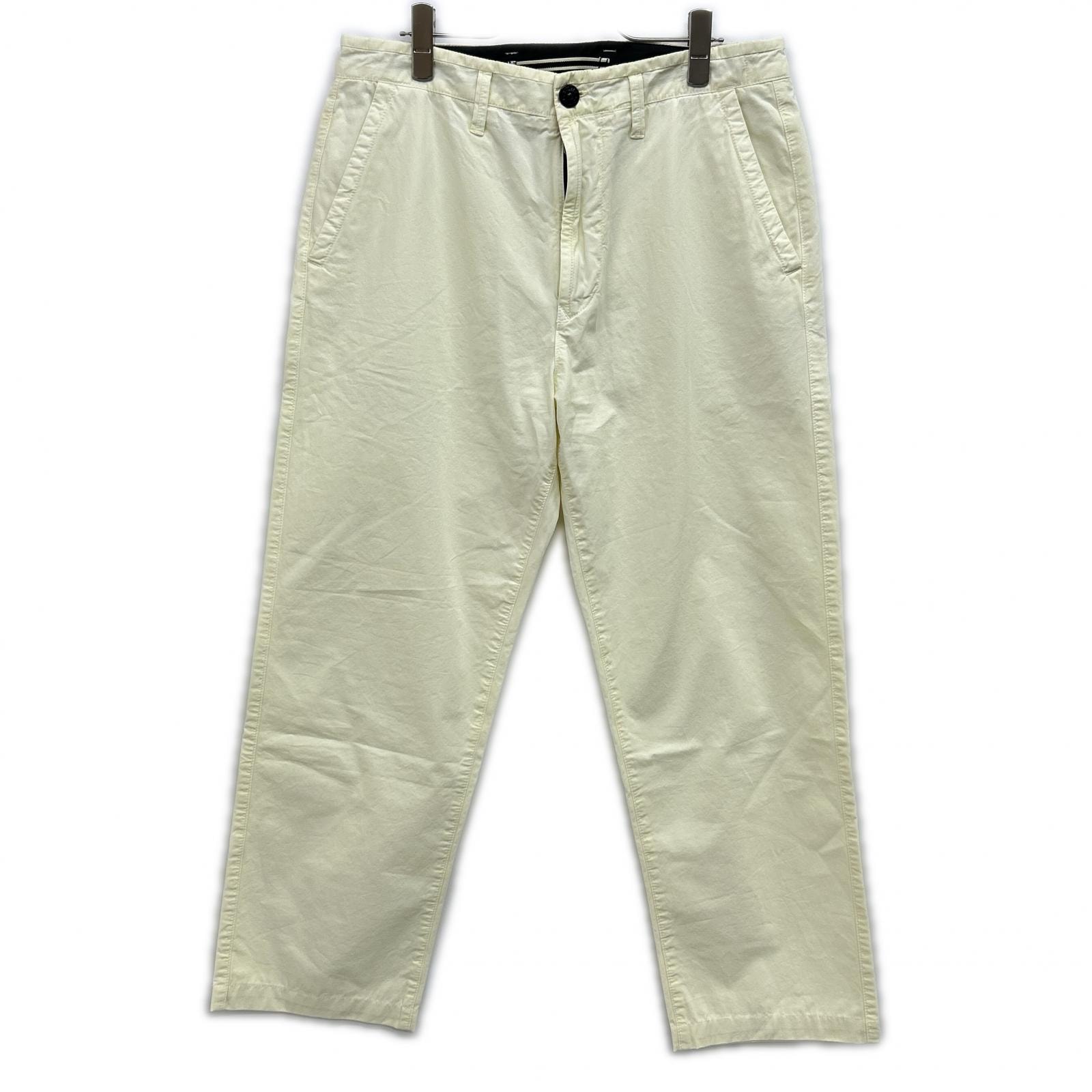 ストーンアイランド イエロー ロゴパッチウォッシュドトラウザーパンツ W31