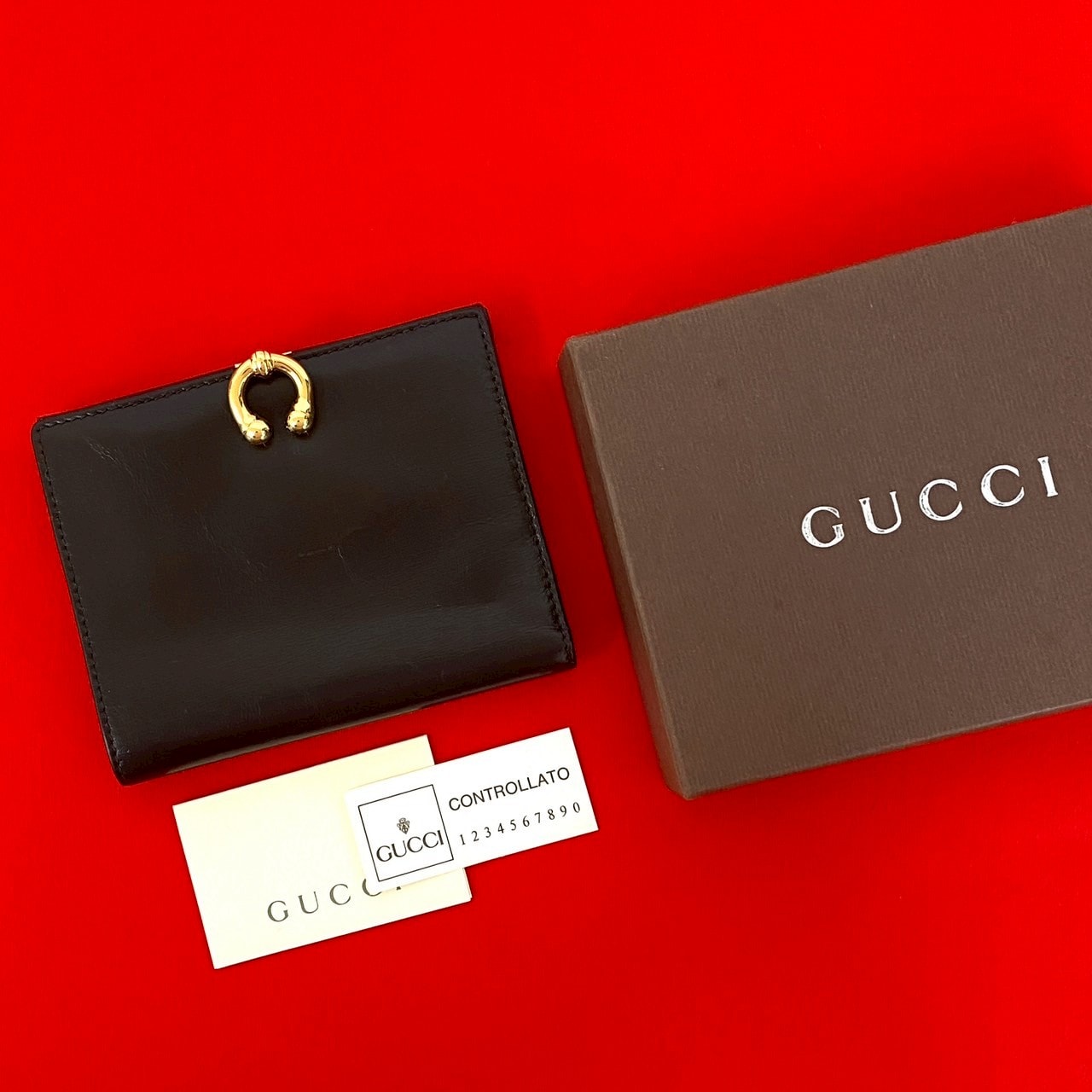 GUCCI グッチ ホースシュー 金具 カーフ レザー 二つ折り財布 ブラウン
25591