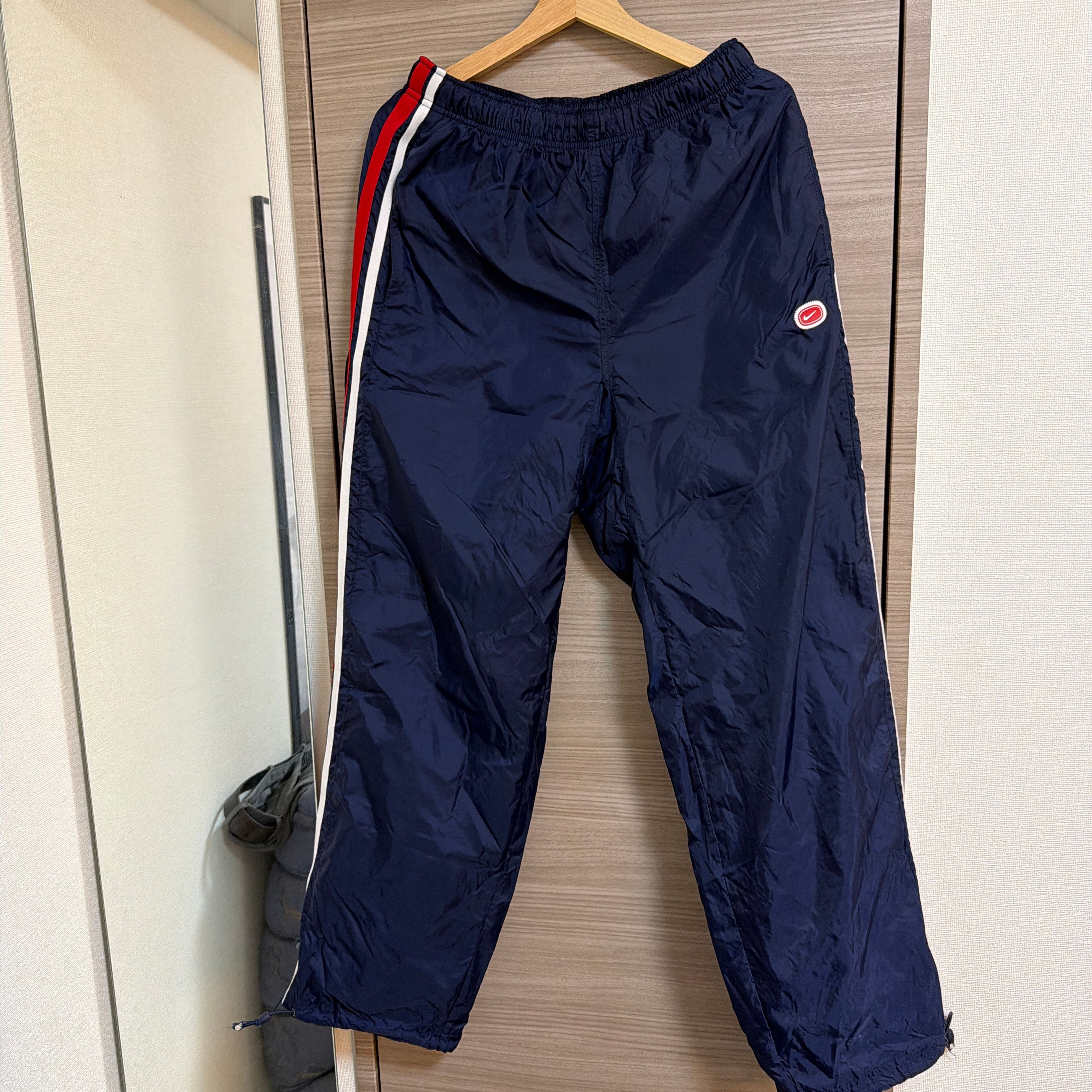 NIKE ナイキ ナイロンパンツ シャカシャカ ジャージパンツ ネイビー レッド
