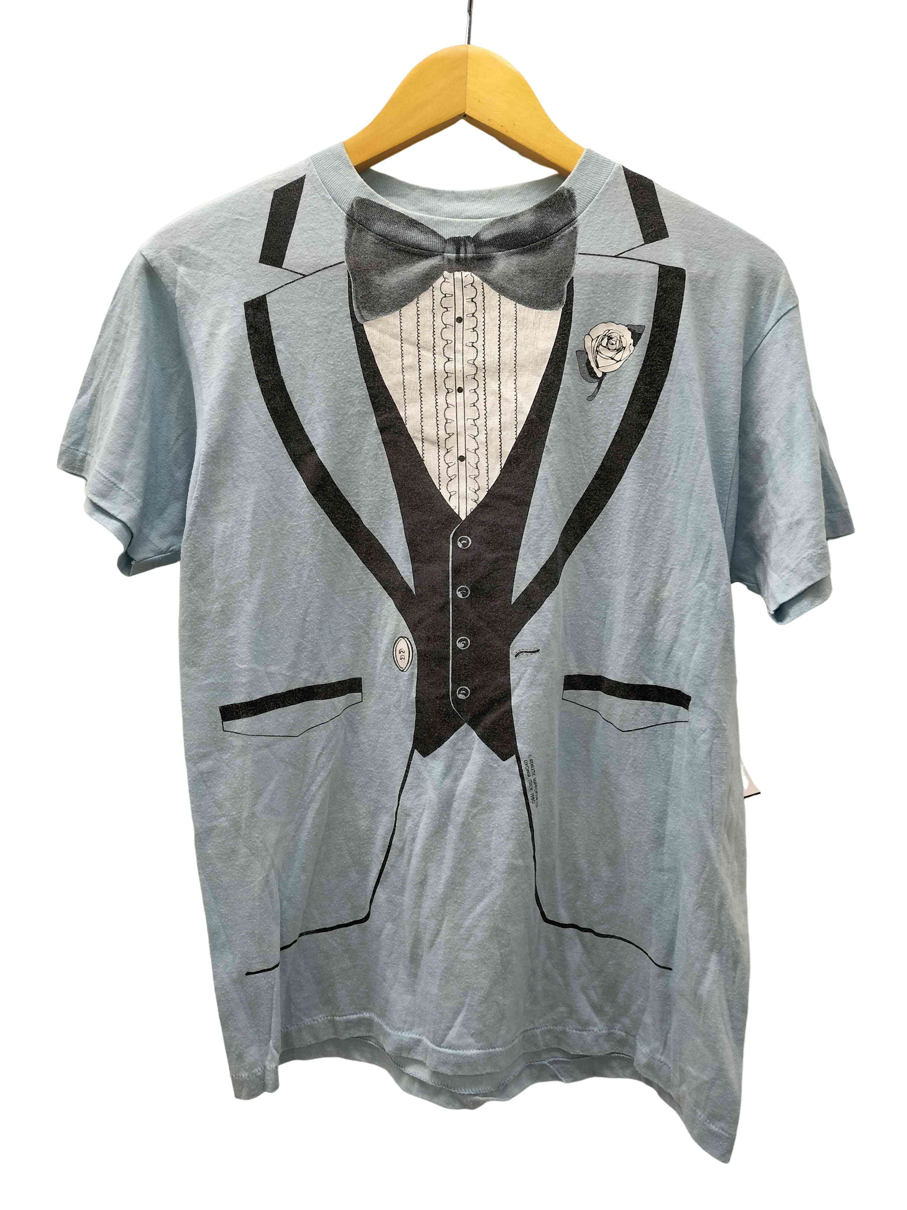 90S USA製 企業ロゴ だまし絵 タキシード 両面プリント  S/S クルーネック Tシャツ 棉ポリ【1139547406804】