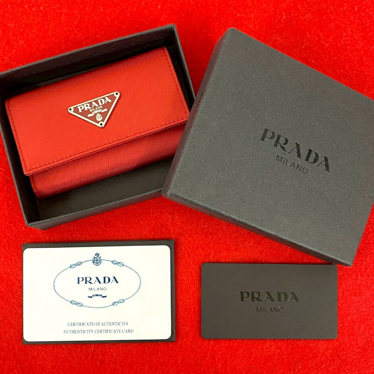 PRADA プラダ 三角ロゴ 金具 ナイロン レザー キーケース レッド
 29342